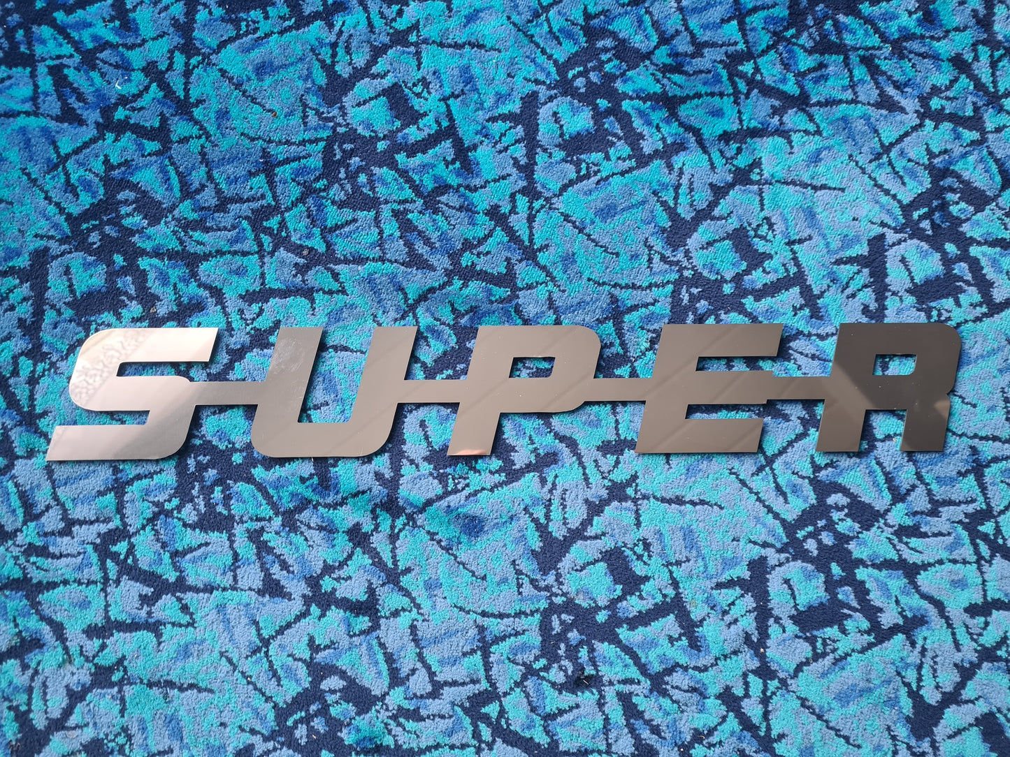 SUPER Emblem in Stainless Steel