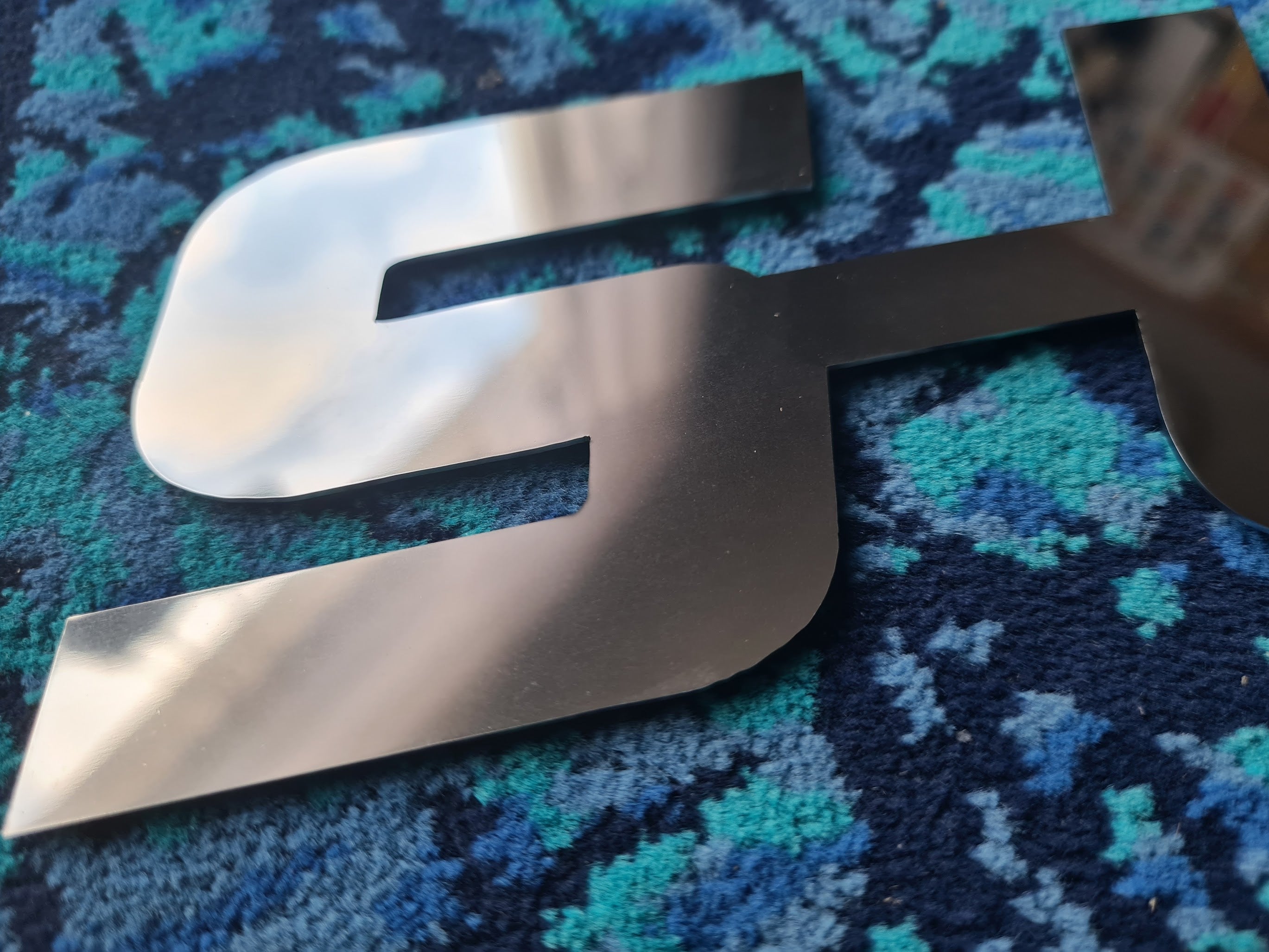 SUPER Emblem in Stainless Steel