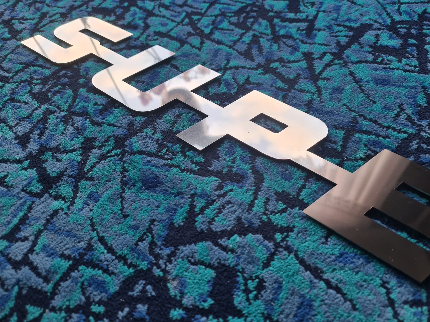 SUPER Emblem in Stainless Steel