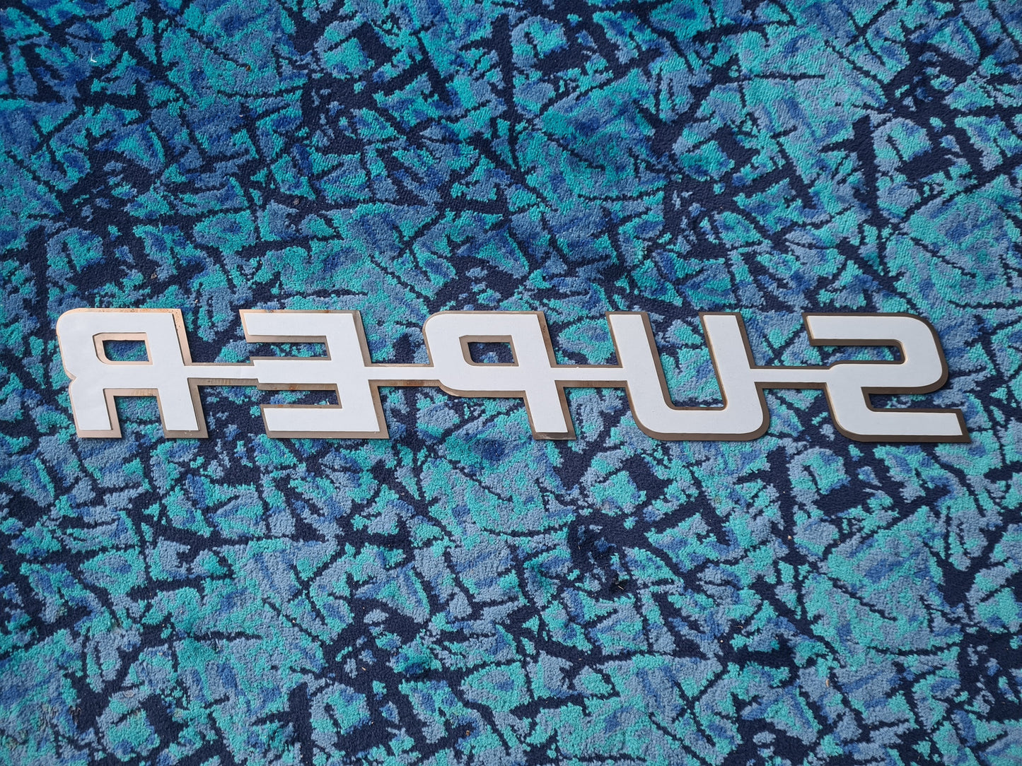 SUPER Emblem in Stainless Steel